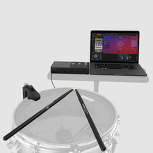 An image of the Starter Pack set up with a drum and laptop